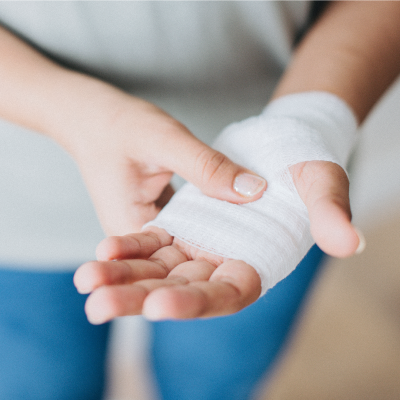 Female hand in bandage palm up